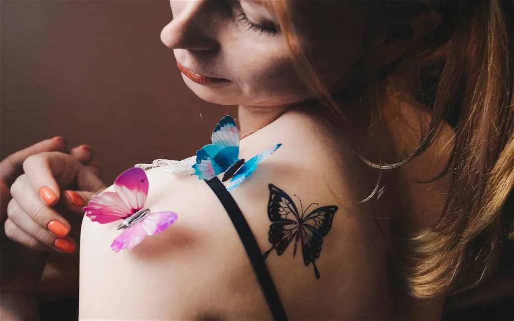 woman-adorned-with-butterflies-in-a-shoulder-portr-2026-09-22-16-16-09-utc (1).jpg