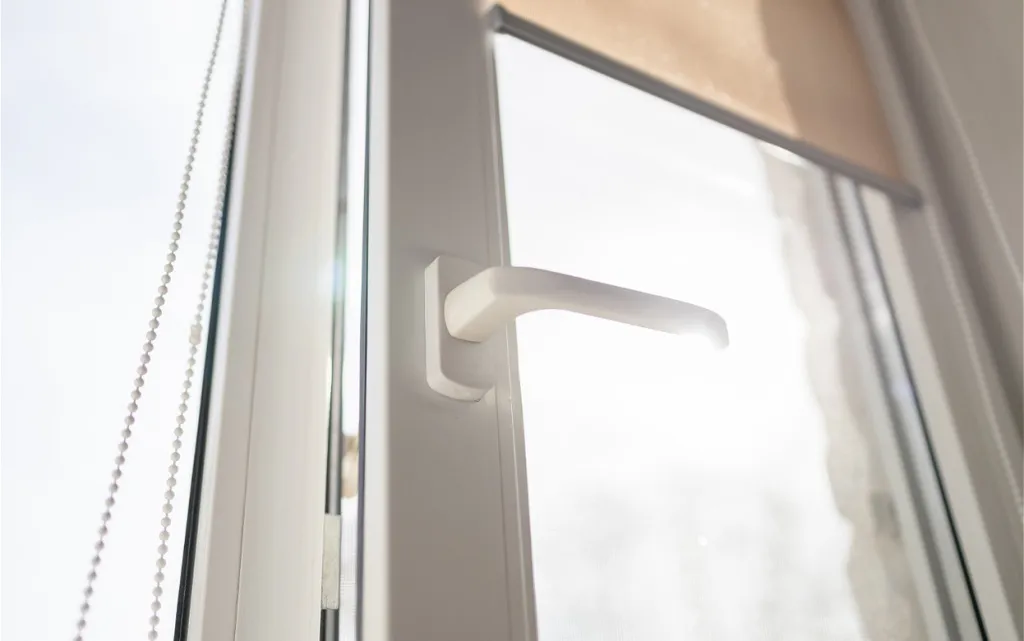 white-window-frame-with-handle-and-shade-2026-09-24-07-03-05-utc (1).jpg
