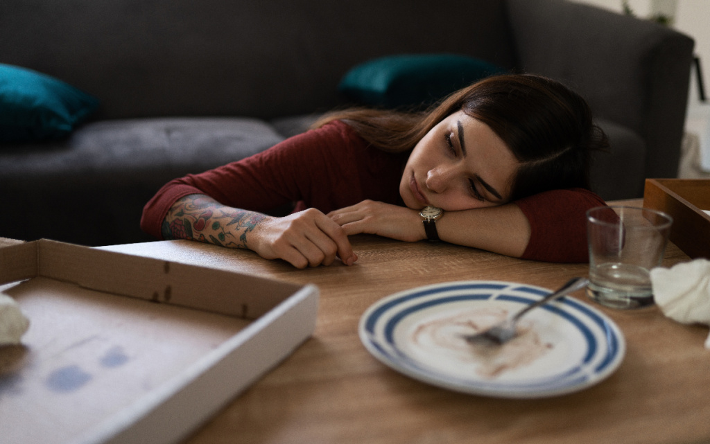 tired-woman-resting-at-table-with-dirty-dishes-2026-03-25-04-12-03-utc (1).jpg