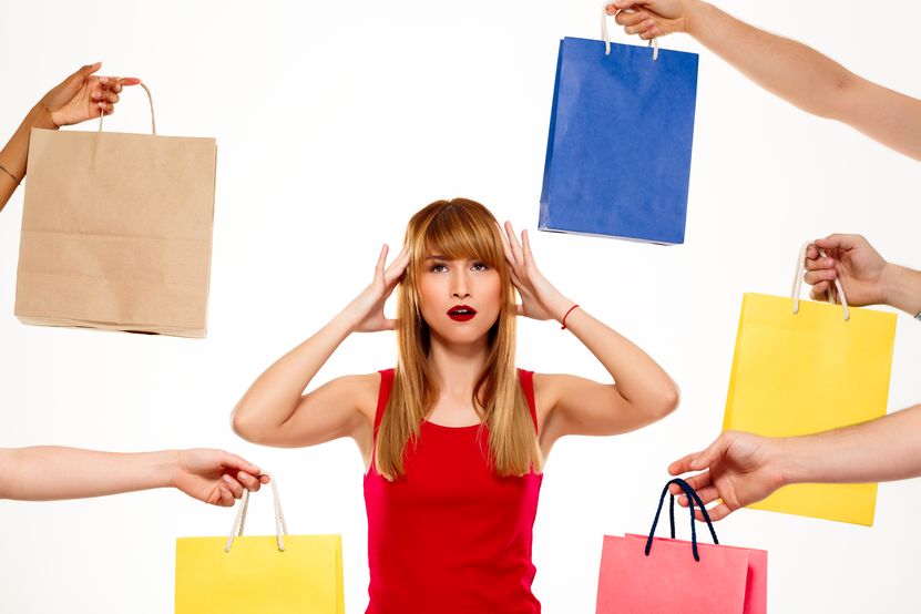 young-beautiful-woman-standing-purchases-white-wall.jpg