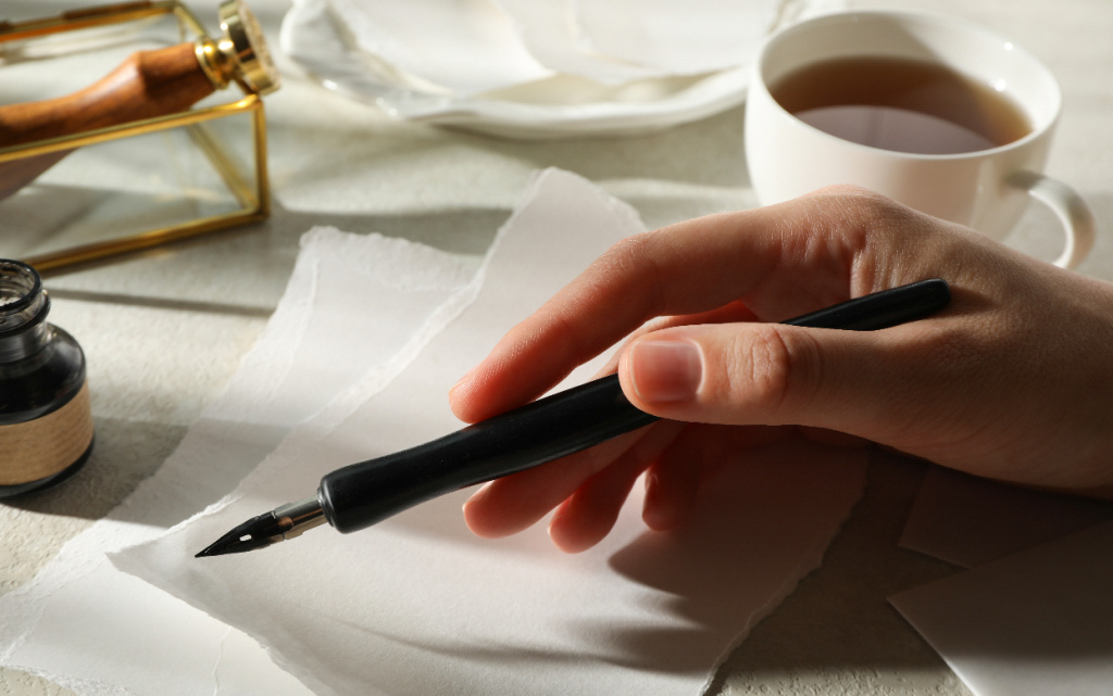 hand-writing-with-ink-on-textured-paper-2026-03-24-21-38-25-utc (1).jpg