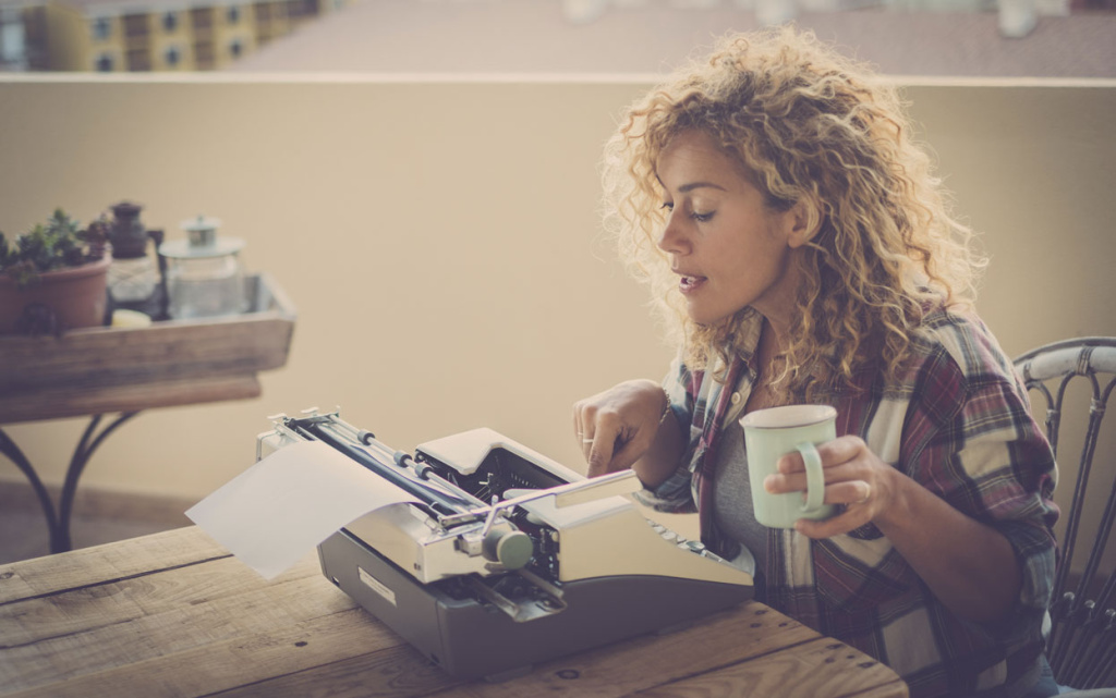 woman-writes-at-typewriter-.jpg