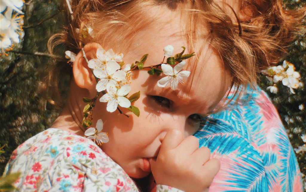 toddler-with-flowers-in-hair-close-up-2026-01-07-05-57-54-utc (1).jpg