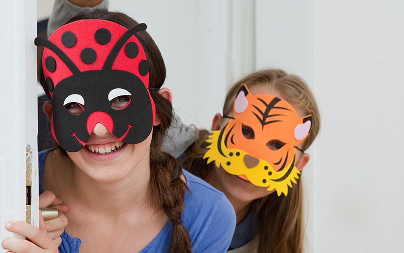 smiling-girls-wearing-colorful-masks-2023-11-27-05-24-03-utc.jpg