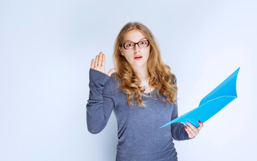 girl-with-blue-folder-raising-her-hand-attention_144627-57807.jpg