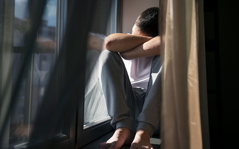 creative-portrait-man-with-curtains-shadows-from-window.jpg