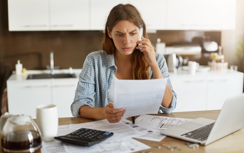 young-woman-checking-her-budget-doing-taxes-2.jpg