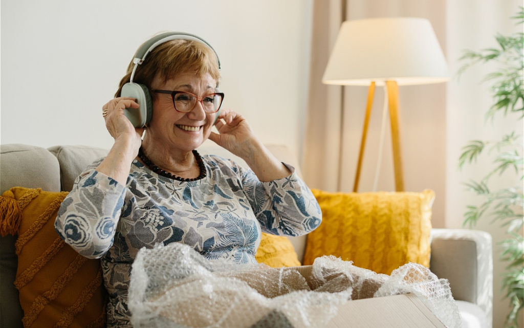 joyful-senior-woman-wearing-headphones-and-unboxin-2026-07-04-00-18-55-utc (1).jpg