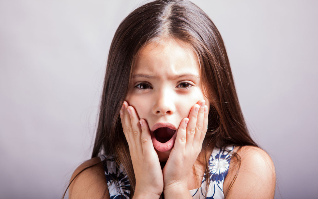 worried-girl-with-hands-on-.jpg
