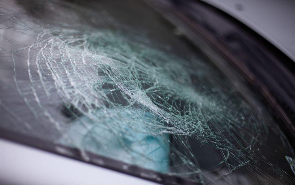 close-up-shot-of-a-smashed-windshield-2026-01-07-07-16-42-utc (1).jpg