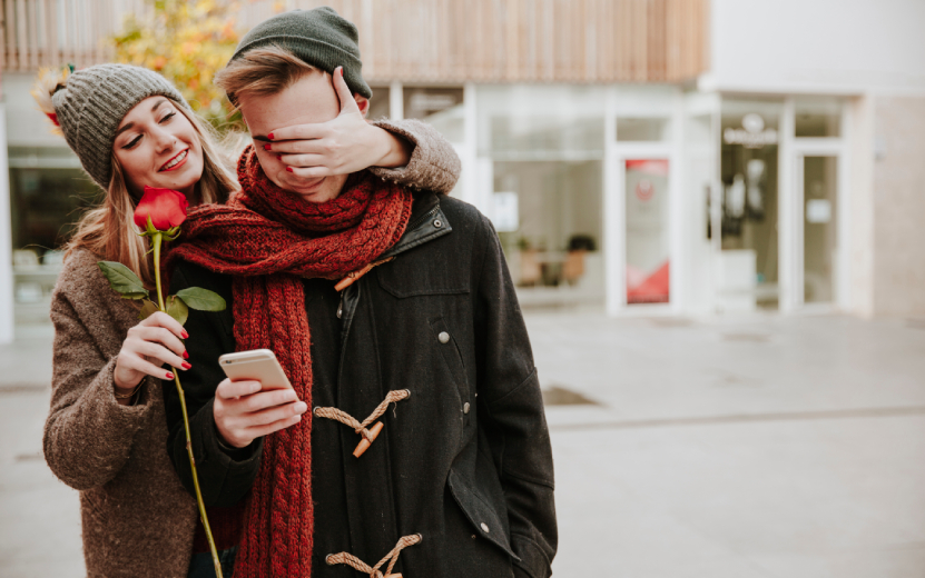 woman-surprising-man-with-rose (1).jpg