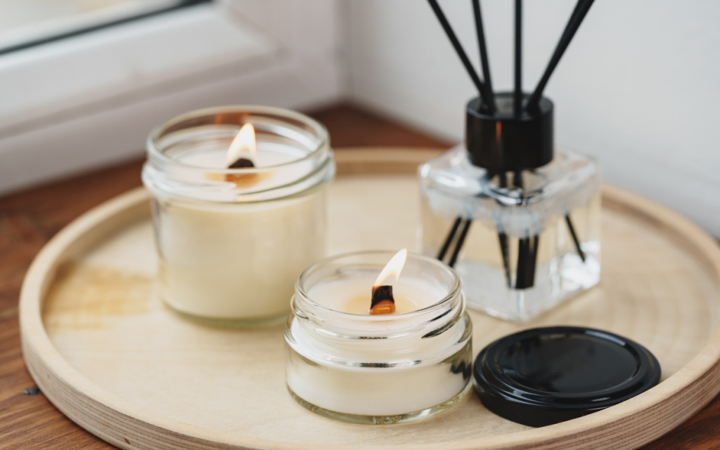 burning-candles-and-reed-diffuser-on-wooden-tray-2026-01-08-22-40-51-utc (1).jpg