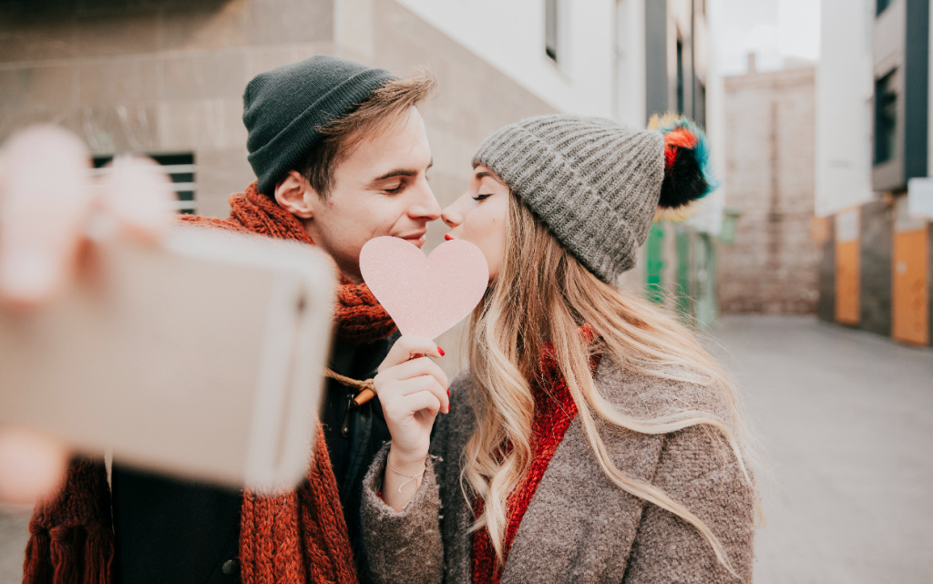 couple-taking-selfie-with-paper-heart (1).jpg