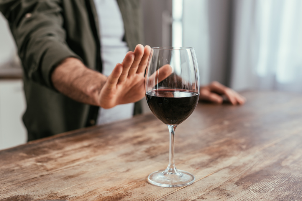 cropped-view-of-man-pulling-hand-to-wine-glass-on-2026-03-11-04-31-12-utc.jpg