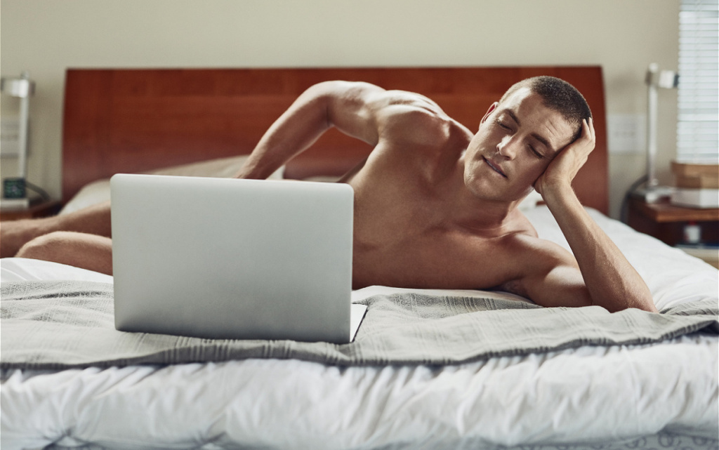 man-resting-on-bed-with-laptop-indoors-2026-01-09-09-45-03-utc (1).jpg