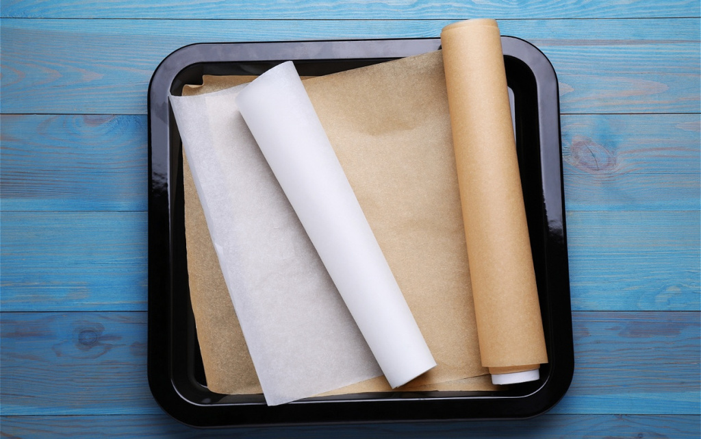 rolls-of-parchment-paper-in-baking-pan-on-light-bl-2026-03-27-01-30-22-utc (1).jpg
