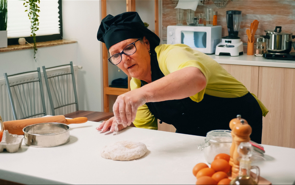 focused-woman-chef-sprinkling-flour-on-fresh-dough-2026-08-10-17-26-57-utc (1).jpg