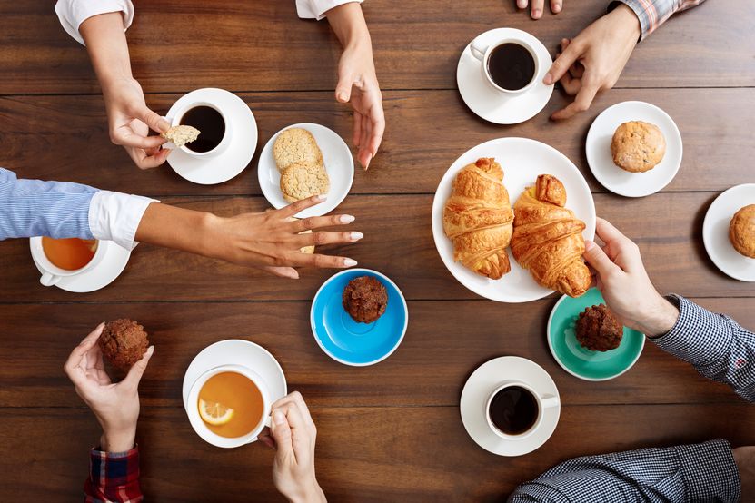 people-hands-wooden-table-with-croissants-coffee.jpg