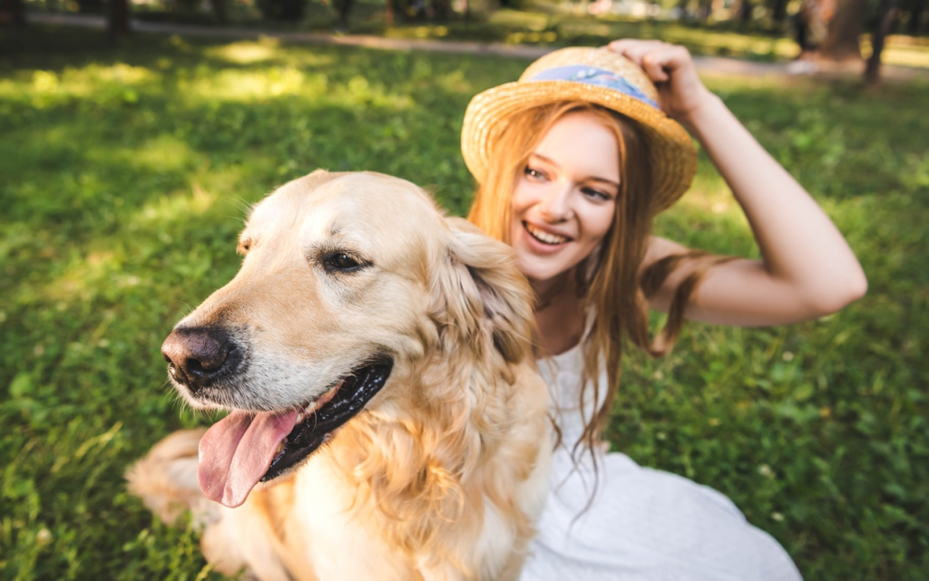 smiling-woman-with-dog-enjoying-the-sunny-park-2026-01-06-00-27-09-utc (1).jpg