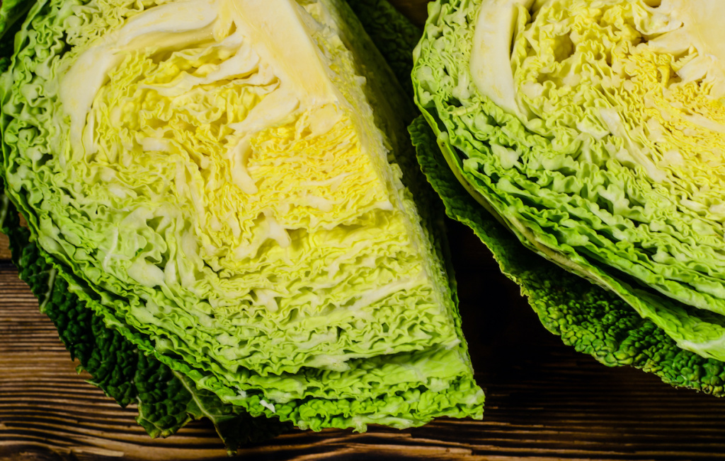 quarters-of-the-savoy-cabbage-on-wooden-table-2026-01-11-07-58-30-utc.jpg