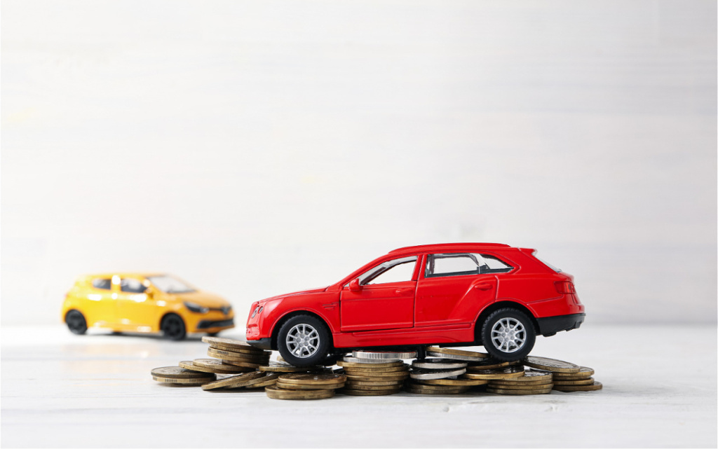 car-savings-plan-with-toy-cars-and-coins-2026-03-25-00-01-11-utc (1).jpg