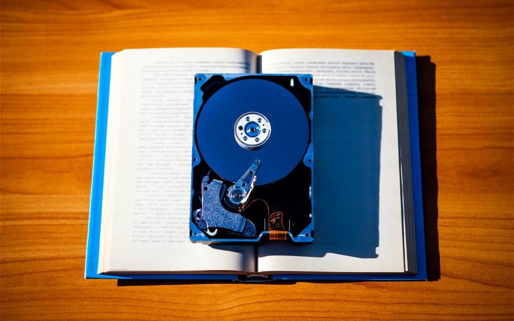 open-book-with-modern-hard-drive-technology-2026-09-24-18-23-48-utc (1).jpg