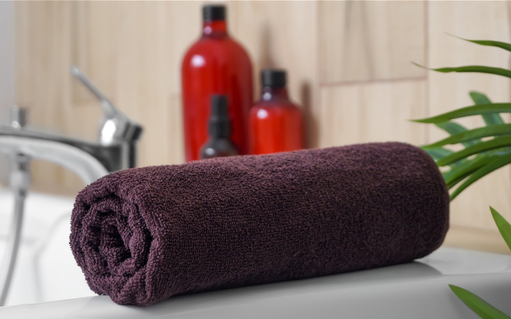 rolled-towel-and-toiletries-in-a-peaceful-bathroom-2026-01-27-17-39-18-utc (1).jpg