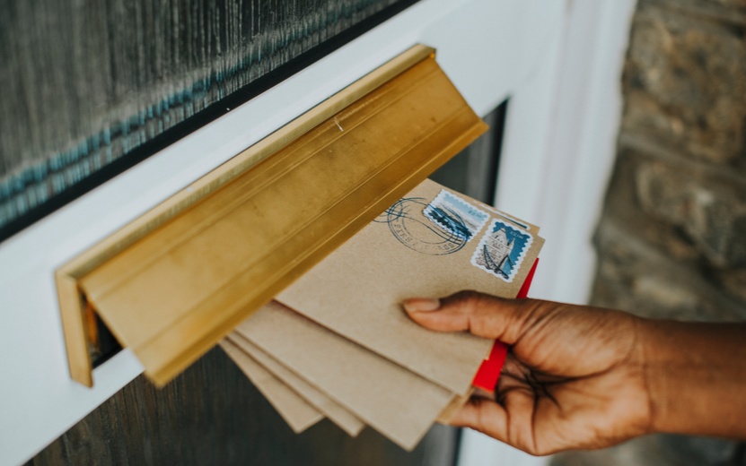 woman-picking-up-mail (1).jpg