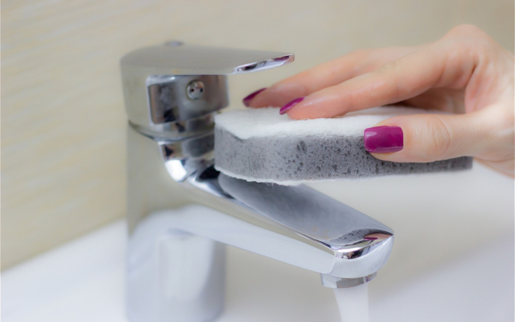 cleaning-a-shiny-faucet-with-a-sponge-2026-03-09-08-45-03-utc (1).jpg