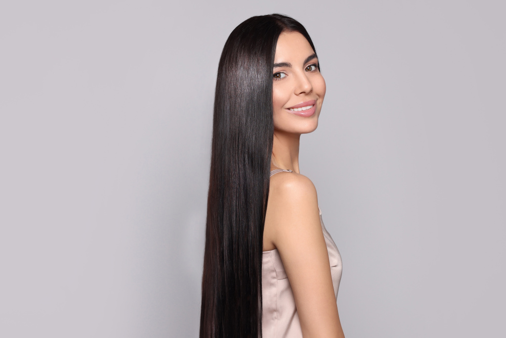 smiling-woman-with-long-glossy-black-hair-2026-01-27-16-30-24-utc.jpg