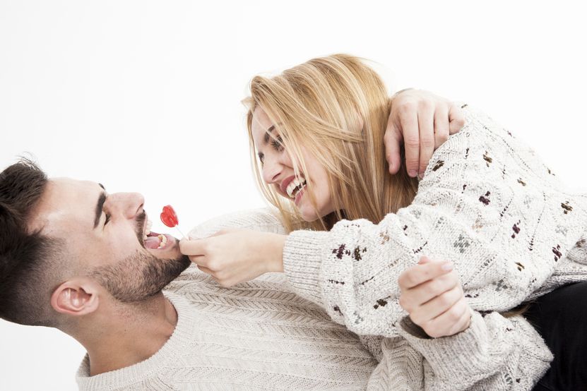 couple-having-fun-with-lollipop.jpg