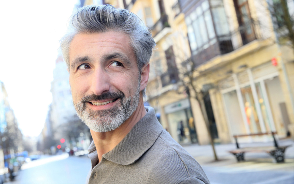 smiling-man-in-urban-setting-looking-off-camera-2026-09-25-02-29-50-utc (1).jpg