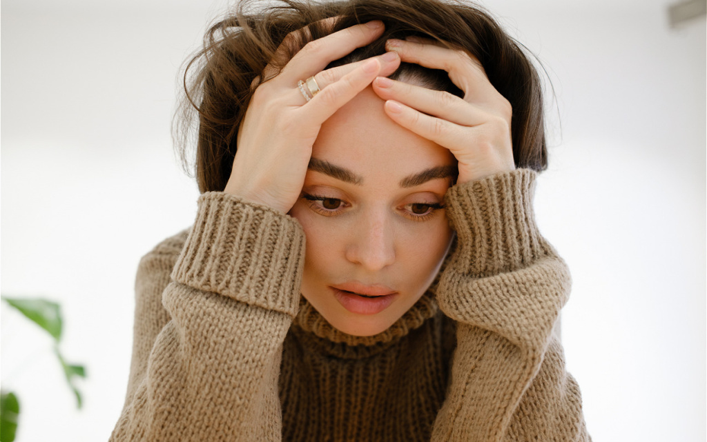 troubled-woman-with-hands-on-her-head-2026-09-24-15-38-59-utc (1).jpg