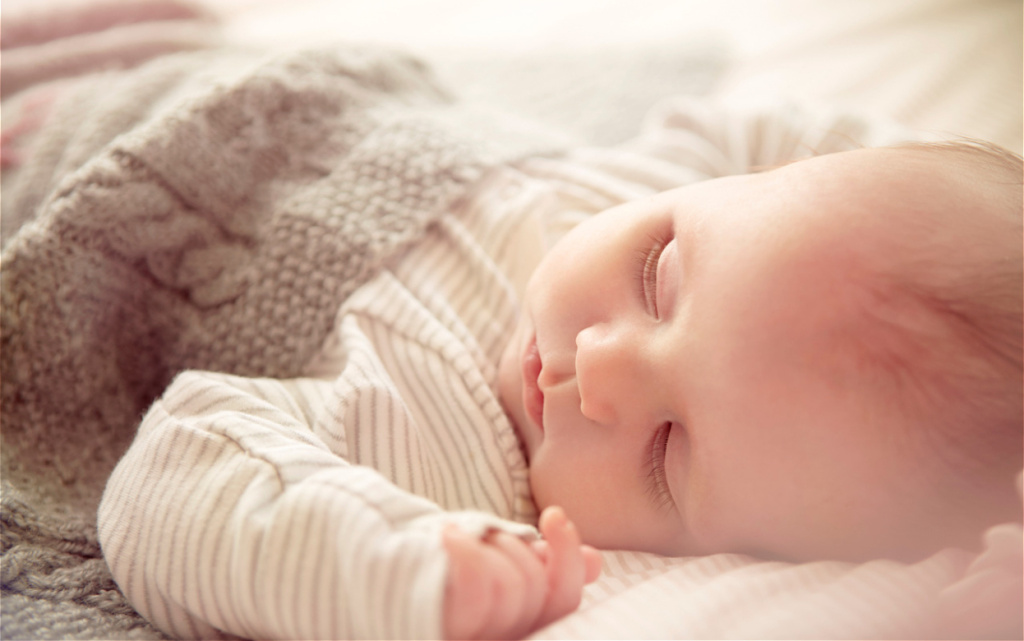 peaceful-infant-sleeps-soundly-on-soft-blanket-2026-03-10-04-49-26-utc (1).jpg