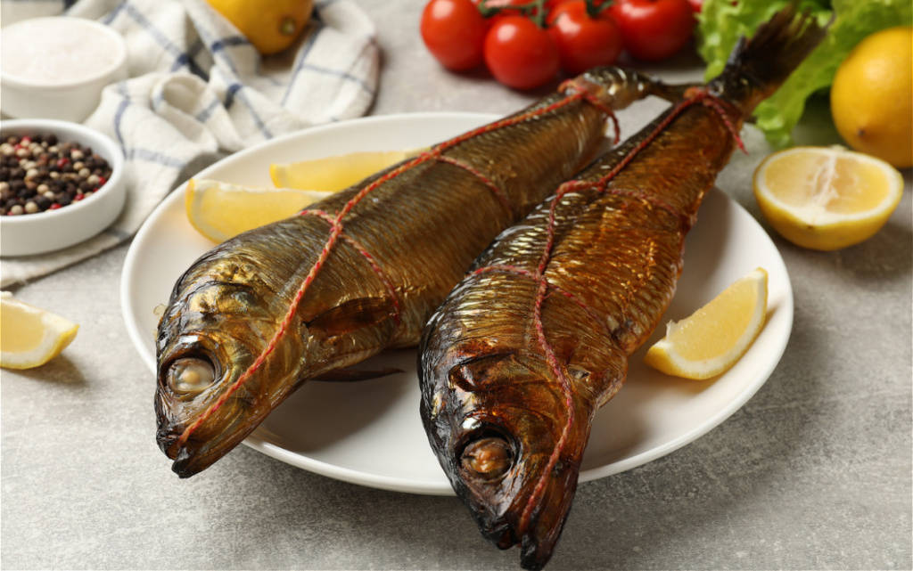 smoked-fish-displayed-with-lemon-and-cherry-tomato-2026-03-09-02-53-34-utc (1).jpg
