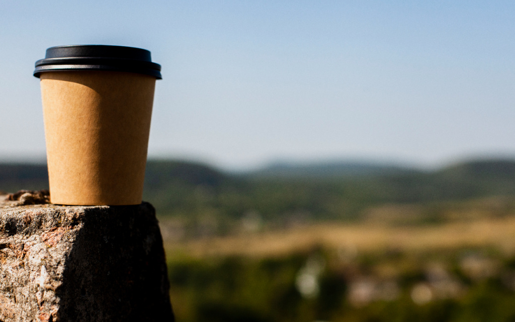 front-view-cup-coffee-with-blural-background (1) (1).jpg