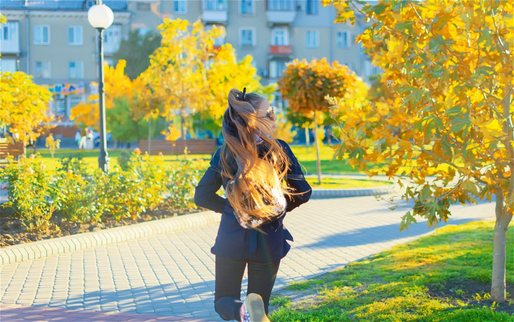 woman-with-long-hair-walking-in-autumn-park-2026-09-22-03-09-08-utc (1).jpg