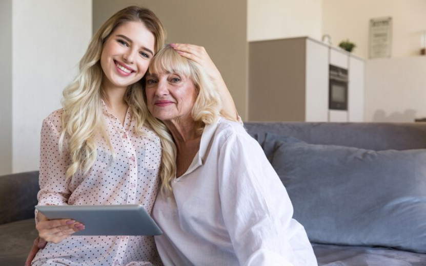 smiling-grandmother-her-granddaughter-posing_171337-7943.jpg