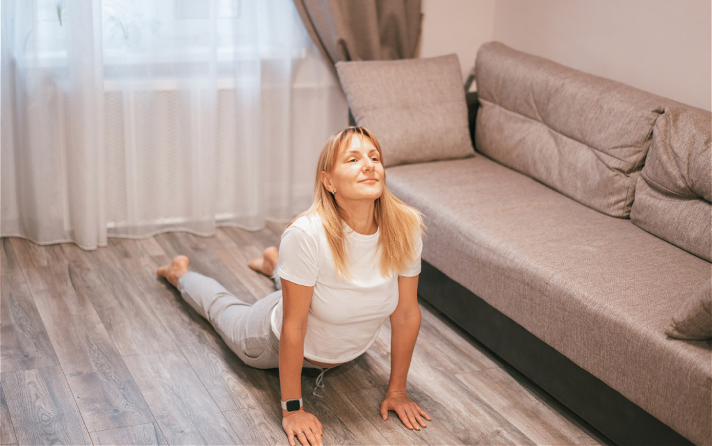 woman-does-yoga-at-home-near-sofa-2026-09-21-13-58-34-utc (1).jpg