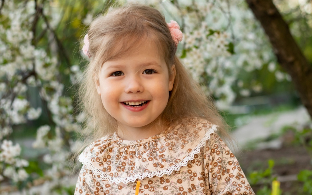 portrait-of-a-smiling-blonde-little-girl-on-the-ba-2026-03-17-07-14-36-utc (1).jpg