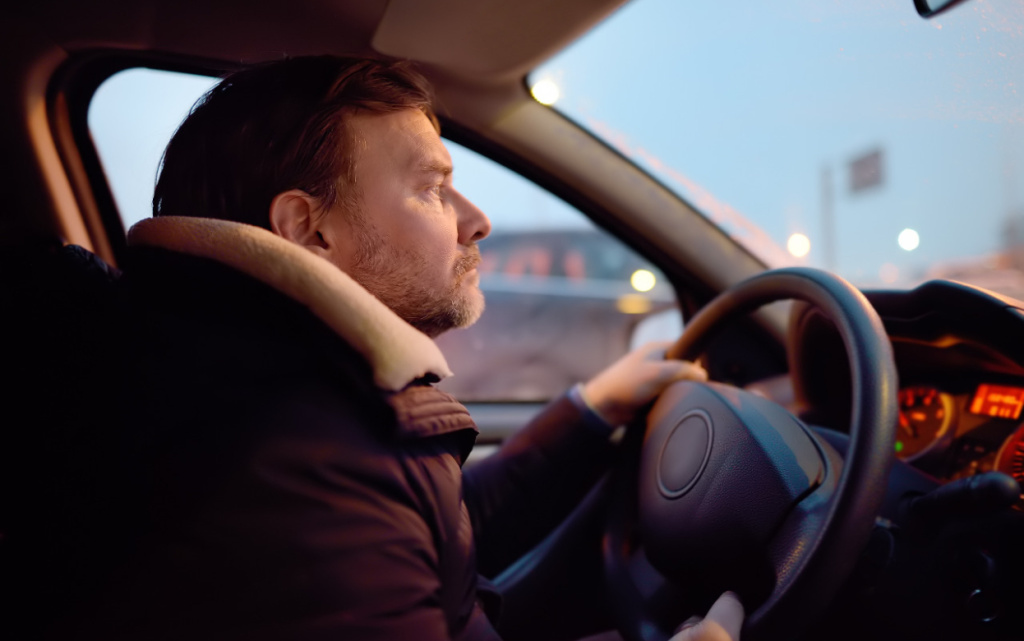 mature-man-driver-riding-a-car-in-city-on-cold-win-2026-01-08-05-07-30-utc (1).jpg