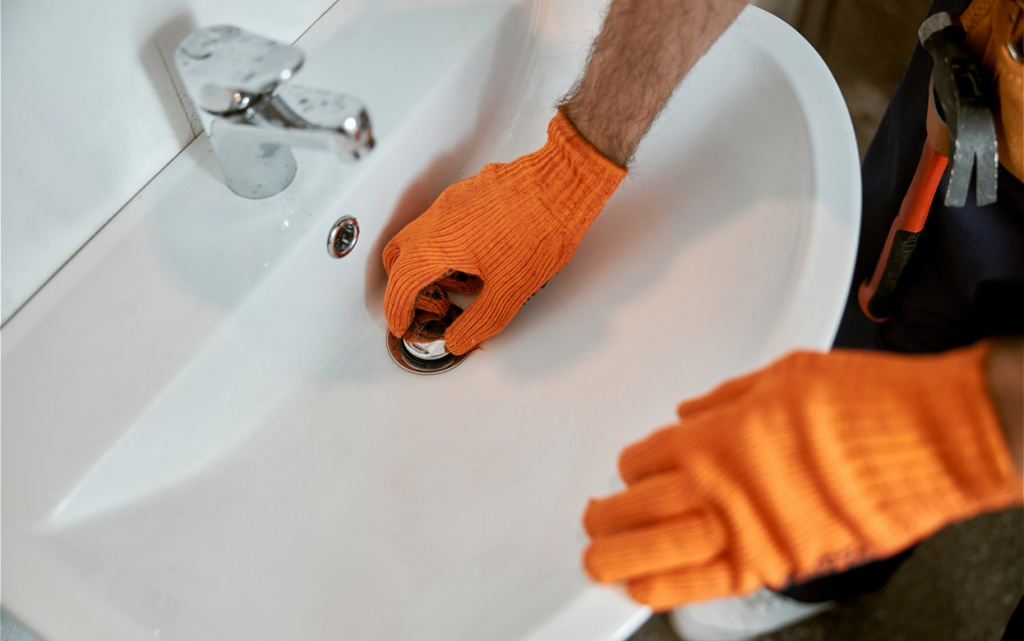 handyman-repairing-sink-in-modern-white-bathroom-2026-03-20-05-56-24-utc (1).jpg