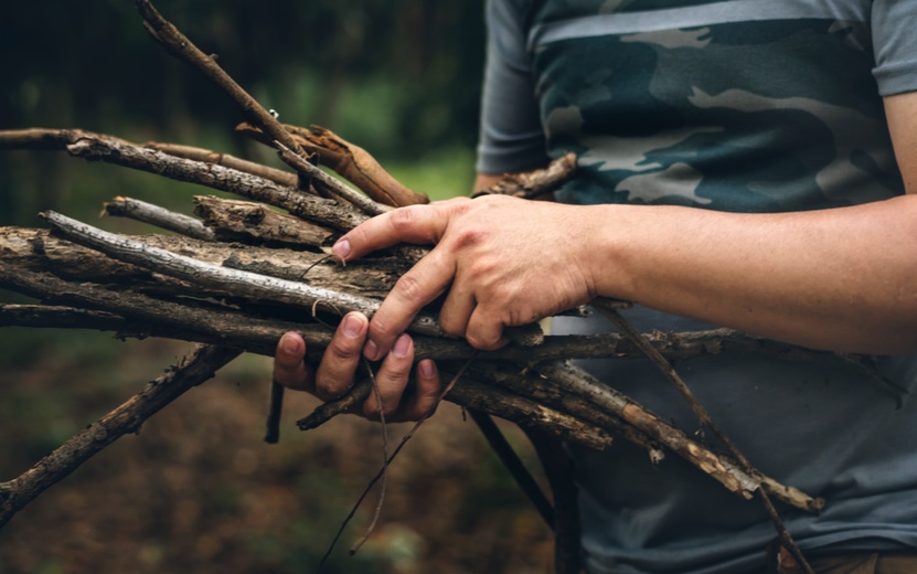 man-gathering-some-firewood-fire (1).jpg