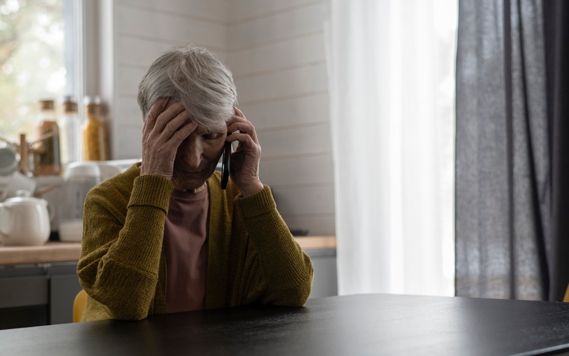 medium-shot-senior-woman-talking-phone-home (1).jpg