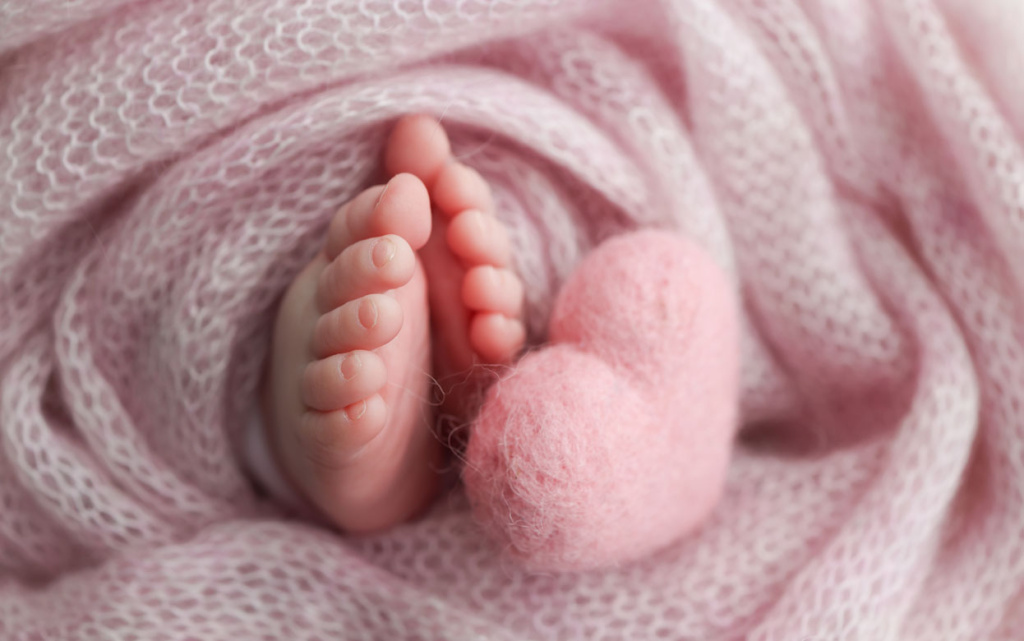 tiny-baby-feet-heart-surrou.jpg