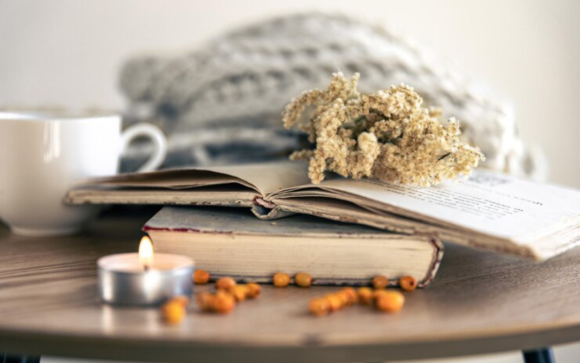 cozy-home-composition-with-books-table-closeup_169016-26087.jpg