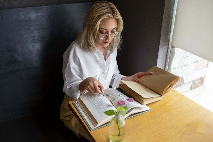 medium-shot-woman-with-diary-book.jpg