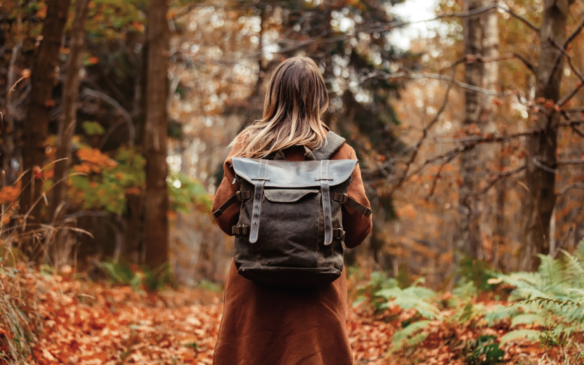 girl-with-a-backpack-in-the-autumn-forest-2022-01-11-15-28-06-utc.jpg