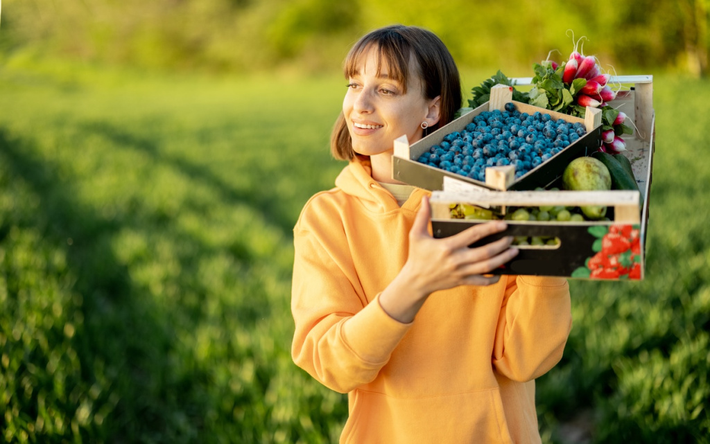 woman-holding-freshly-picked-berries-and-vegetable-2026-03-23-23-26-26-utc (1).jpg