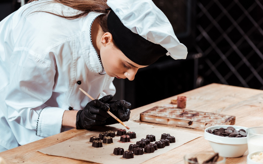 woman-decorating-beautiful-chocolate-candy-in-a-ki-2026-09-22-19-52-27-utc (1).jpg